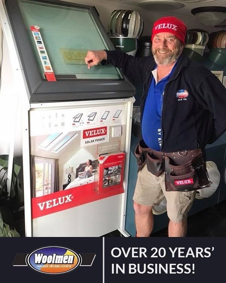 A Man Is Standing In Front Of A Velux Display — The Woolmen In Alstonville, NSW