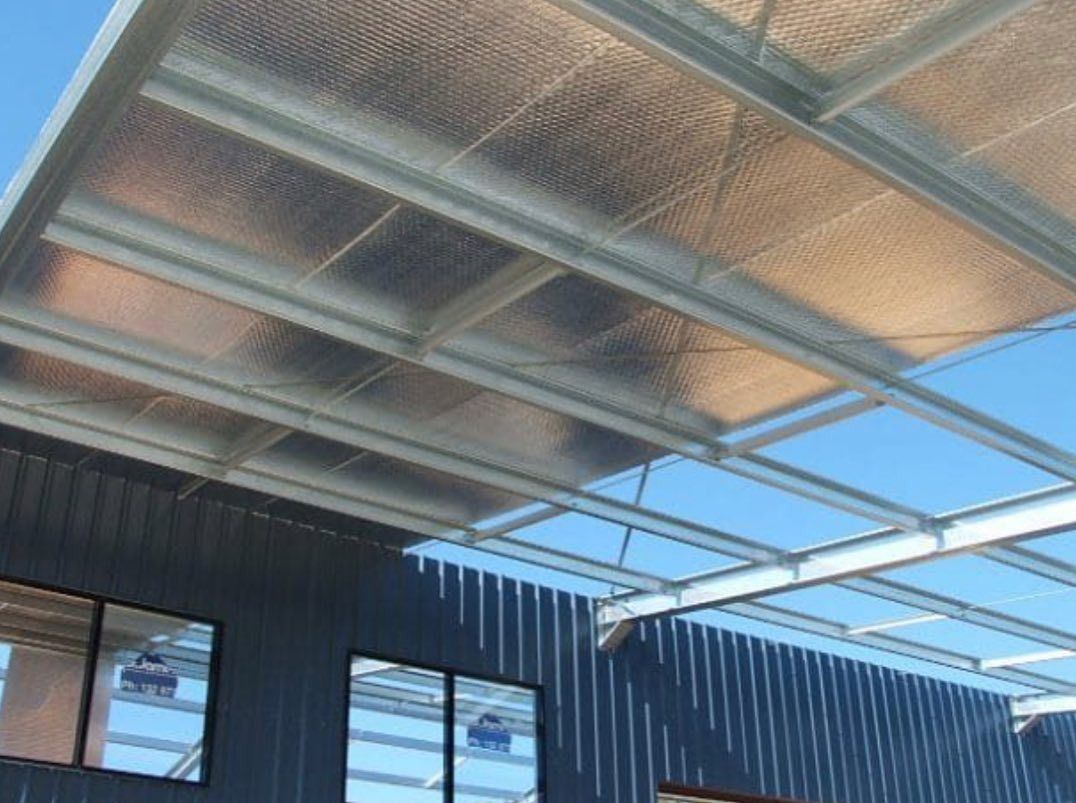 A Building With A Clear Roof And A Blue Sky In The Background — The Woolmen In Alstonville, NSW