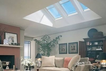 A Living Room With A Couch And Skylights On The Ceiling — The Woolmen In Alstonville, NSW