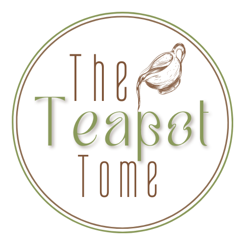 Logo with “The Teasot Tome” in brown and sage green inside a thin circular border, with a teapot illustration.