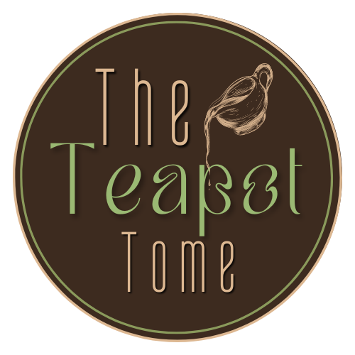 Circular brown logo with green border reading “The Teapot Time” and a small teapot illustration