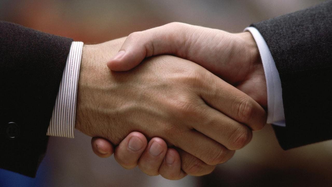 Certified — Business Partner Handshake in Valley, NY