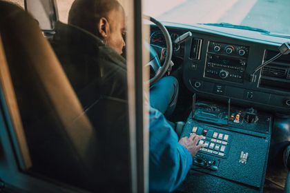 Technician performing ADAS sensor recalibration on a modern vehicle in Dallas, Fort Worth, TX, ensuring accurate lane, keeping assist and adaptive cruise control functionality.