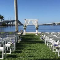 outdoor wedding ceremony with white flowers