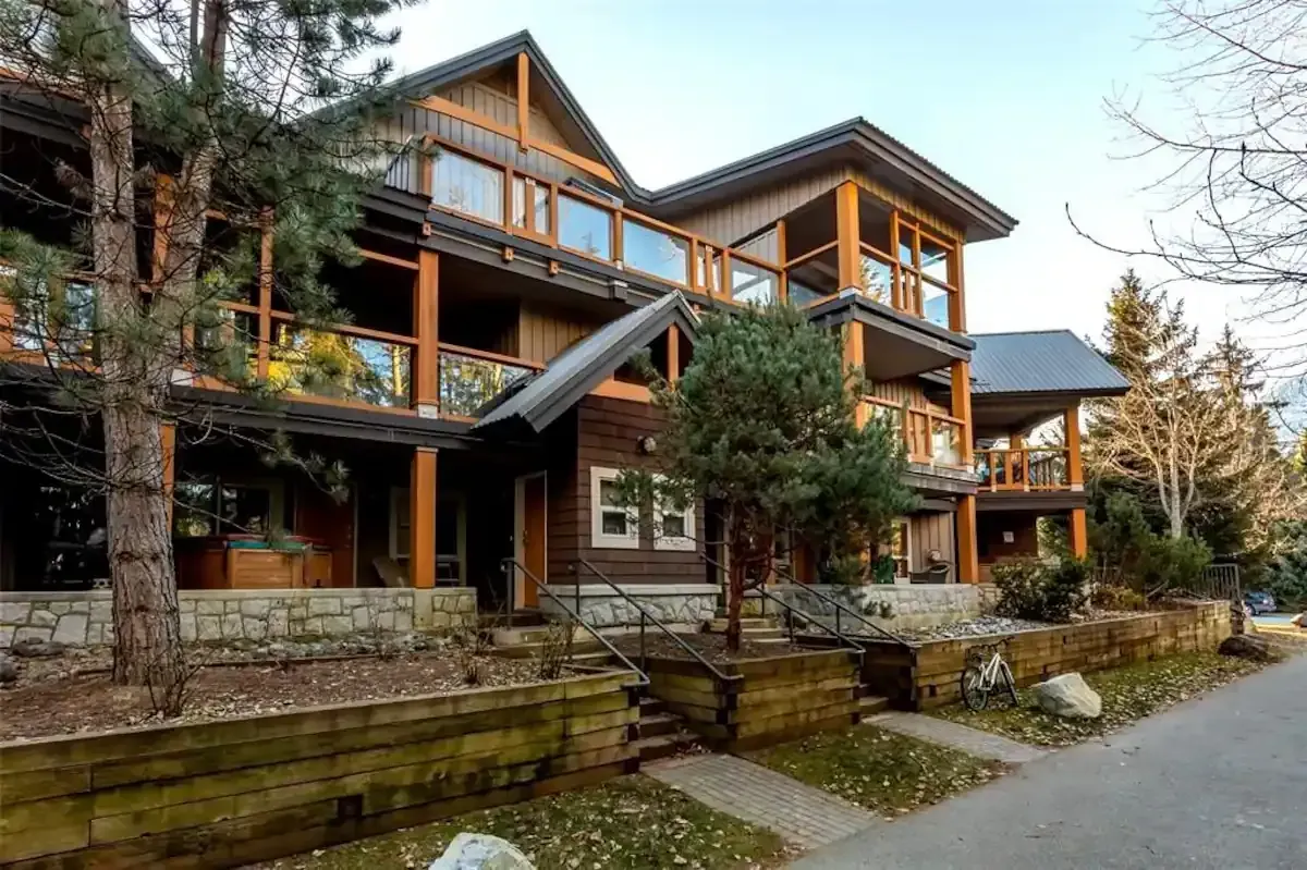 A large house with a lot of windows and balconies