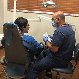Patient in dental chair at Sewell Dental Design