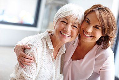 Elderly woman and duaghter at Sewell Dental Design