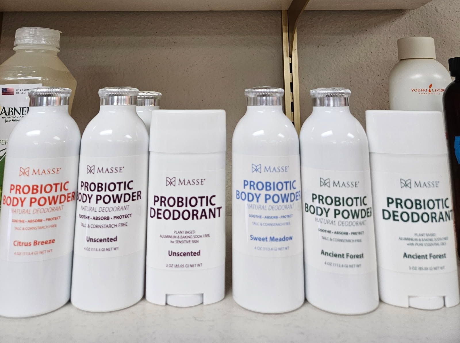 Various white bottles and sticks of