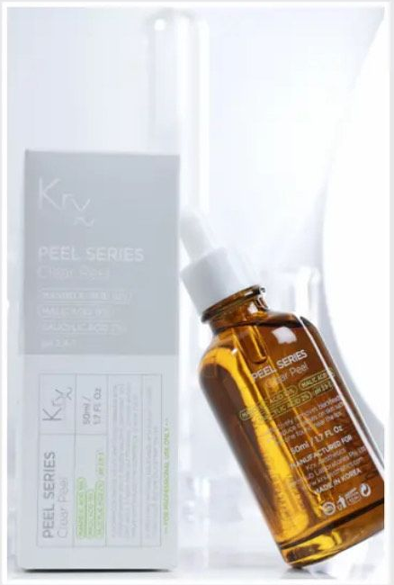 A woman is getting a facial cleaned.