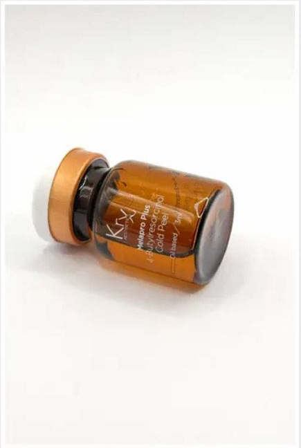 A woman is getting a facial treatment at a beauty salon.