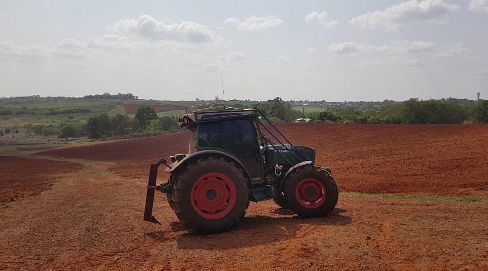 Tractor on Red Dirt Australian Farm Outback — Soil Conditioning in Alloway, QLD