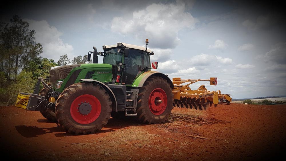 Tractor on Fresh Red Dirt — Soil Conditioning in Alloway, QLD