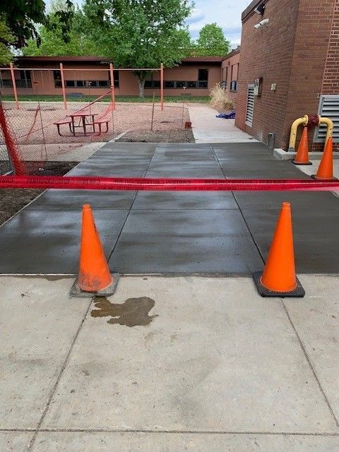 Concrete Walkway With Orange Cones — Gibsonia, PA — Langell Concrete Construction
