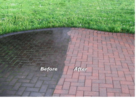 Brick patio half cleaned with power washer, showing