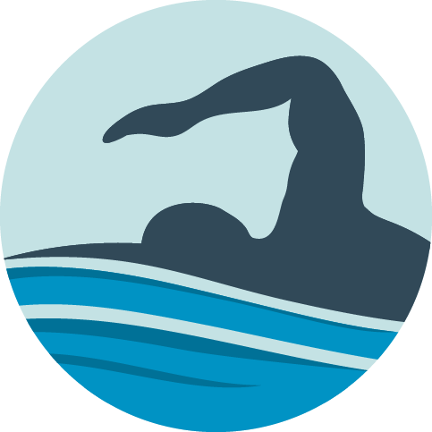 Silhouette of swimmer in blue water.