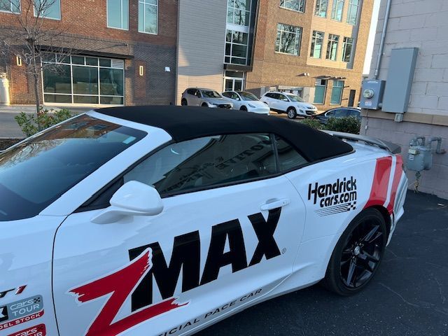 White Camaro convertible with