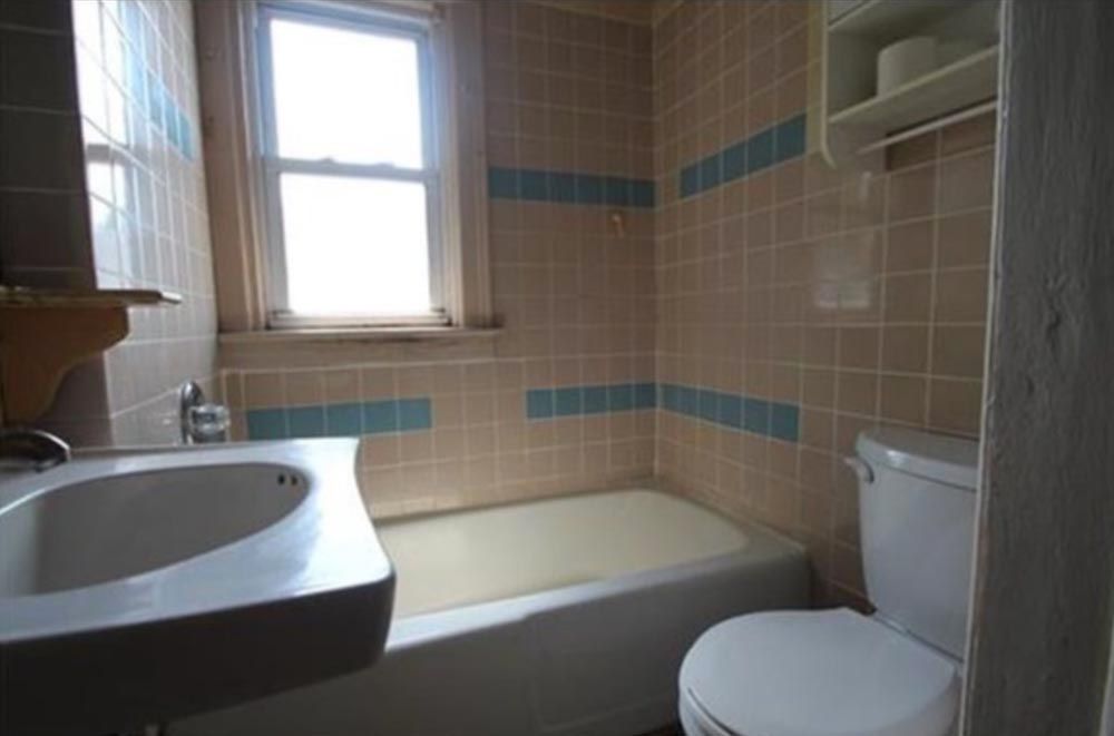 Close-up of a newly installed asphalt shingle roof with dormer window, completed by DMF Construction in Scotch Plains, NJ