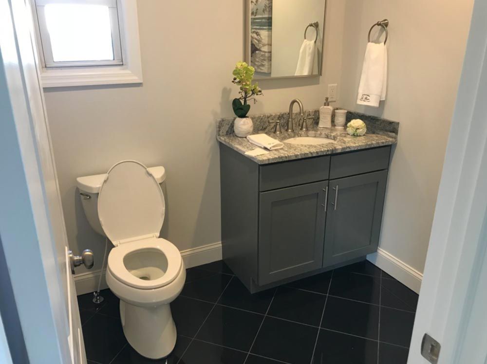 Modern bathroom remodeling project by DMF Construction in Scotch Plains, NJ