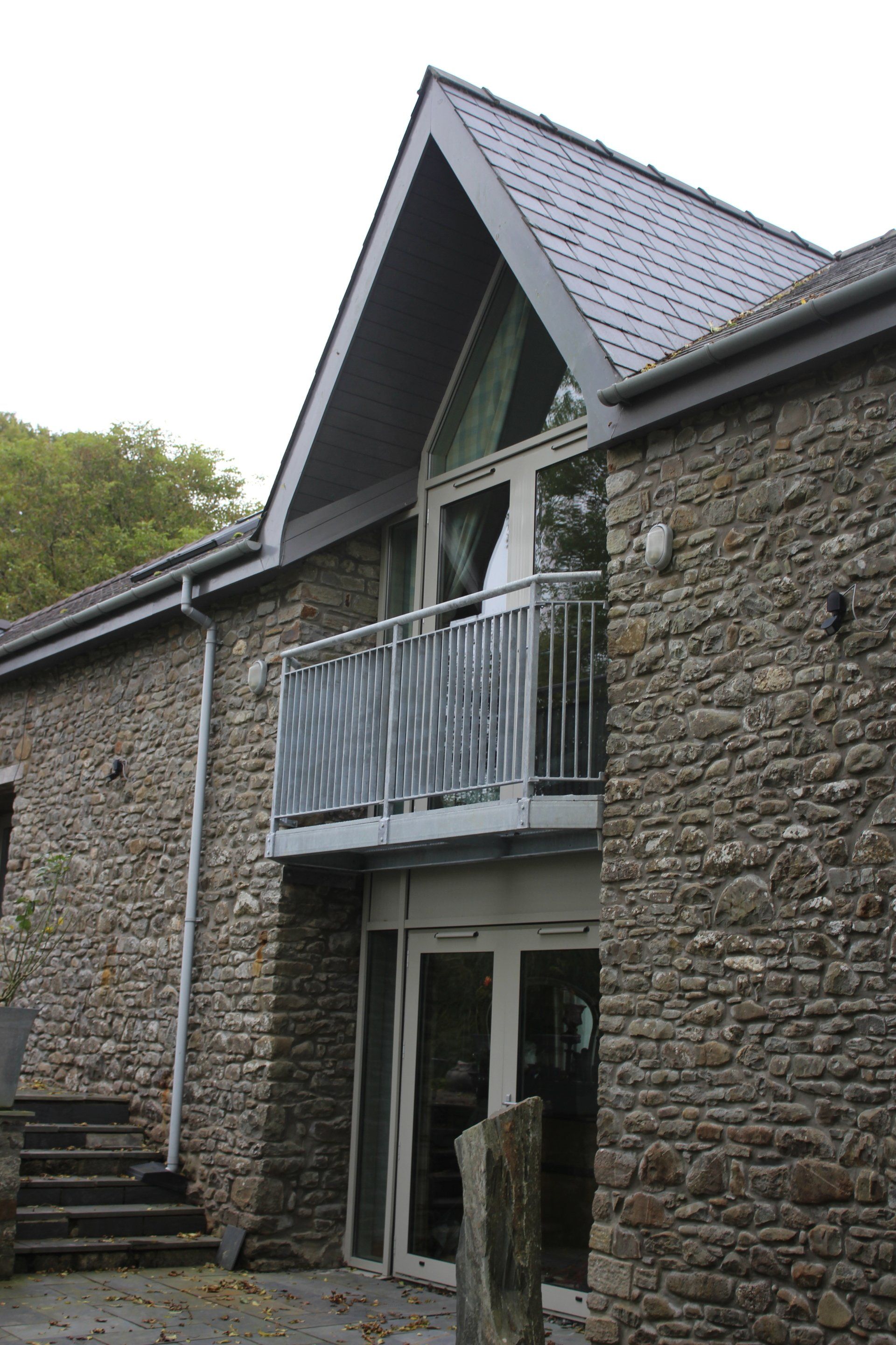 Contemporary balcony  by  award winning blacksmith William Holland