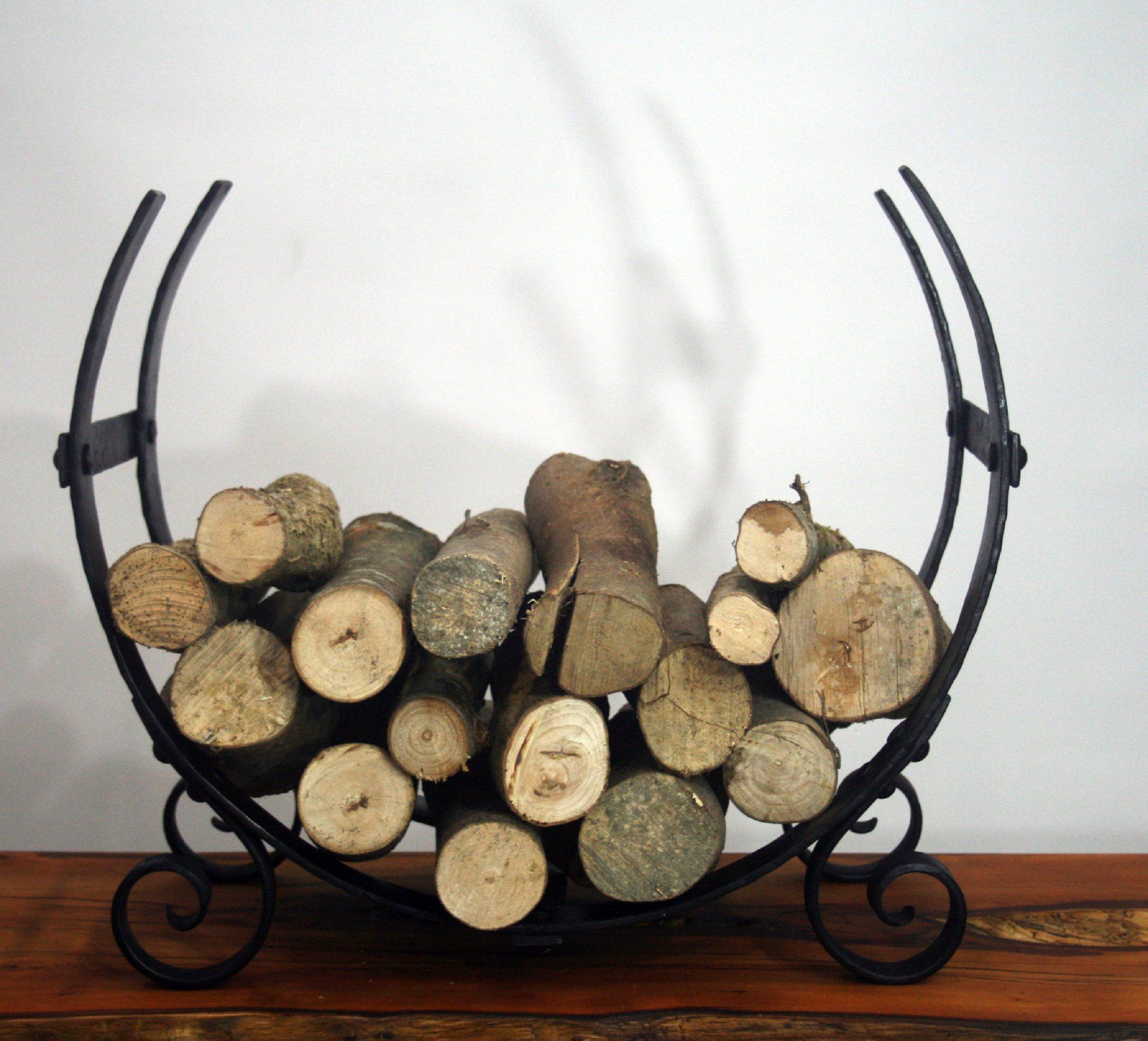 hand made log ring by award winning blacksmith William Holland