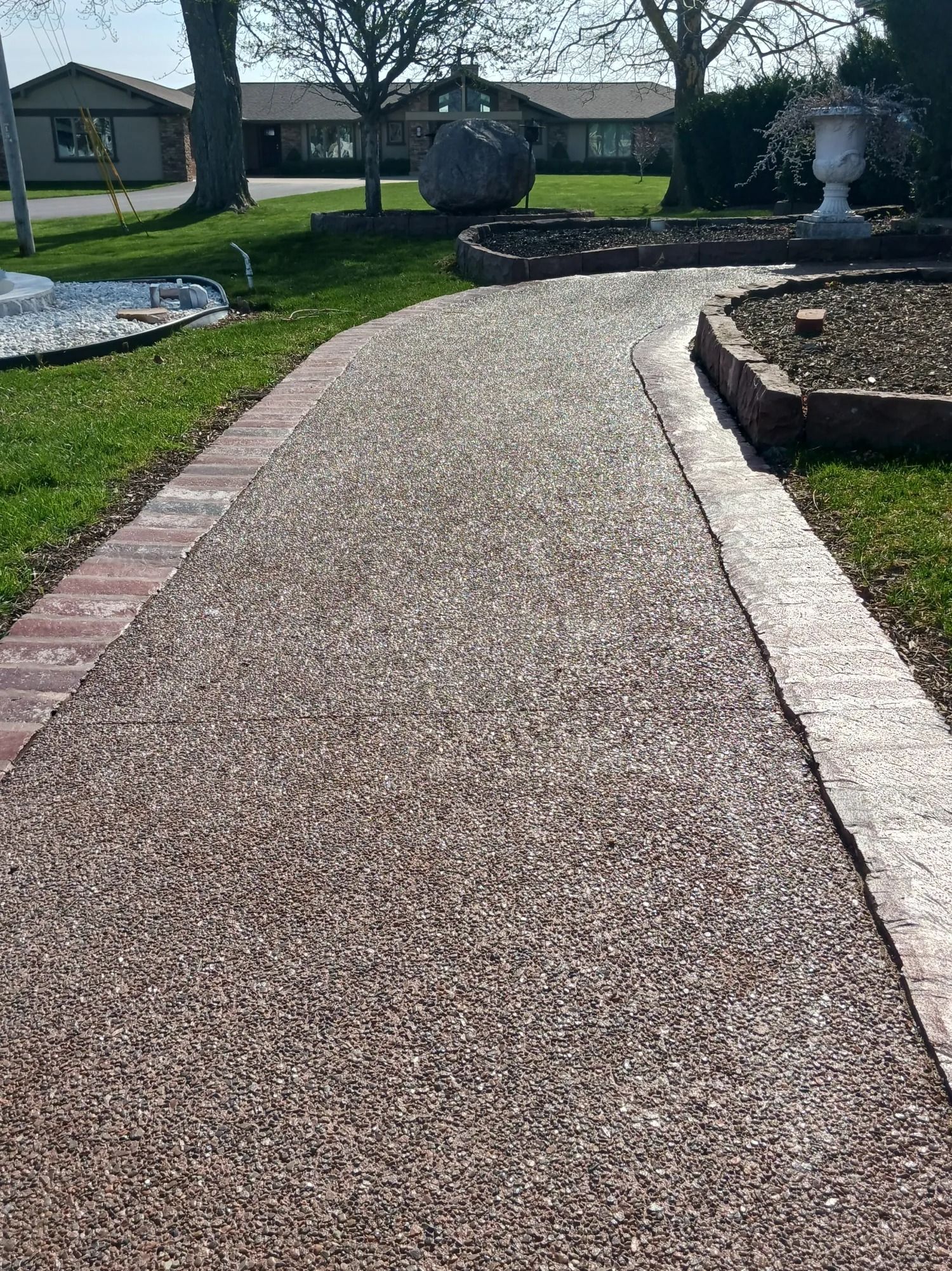 A paved pathway with brick borders.