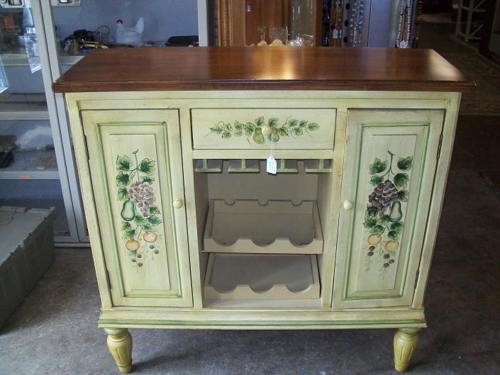 hand painted hutch with wine bottle shelves