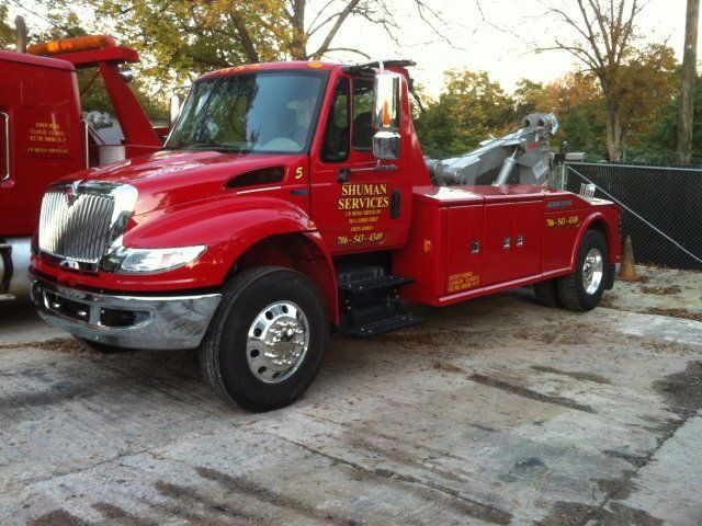 Red Truck Used For Towing — Athens, GA — Shuman Services