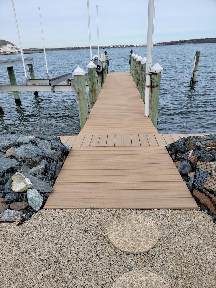 A wooden dock leading into a body of water.