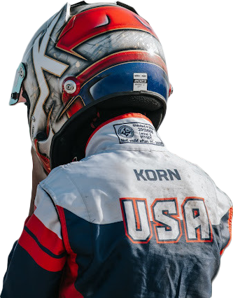 A person wearing a helmet and a jacket with the word usa on the back.