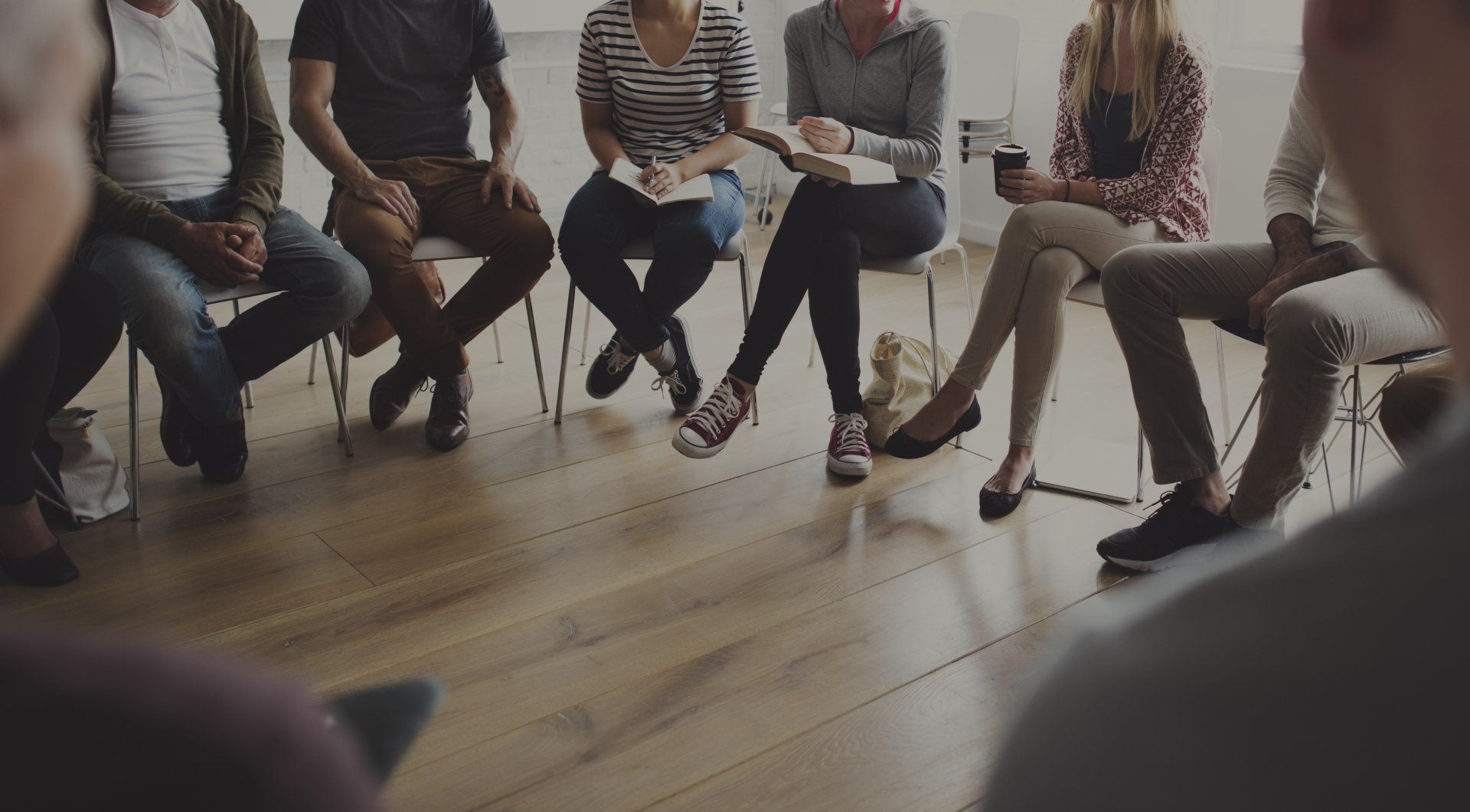 People sitting in a circle counseling