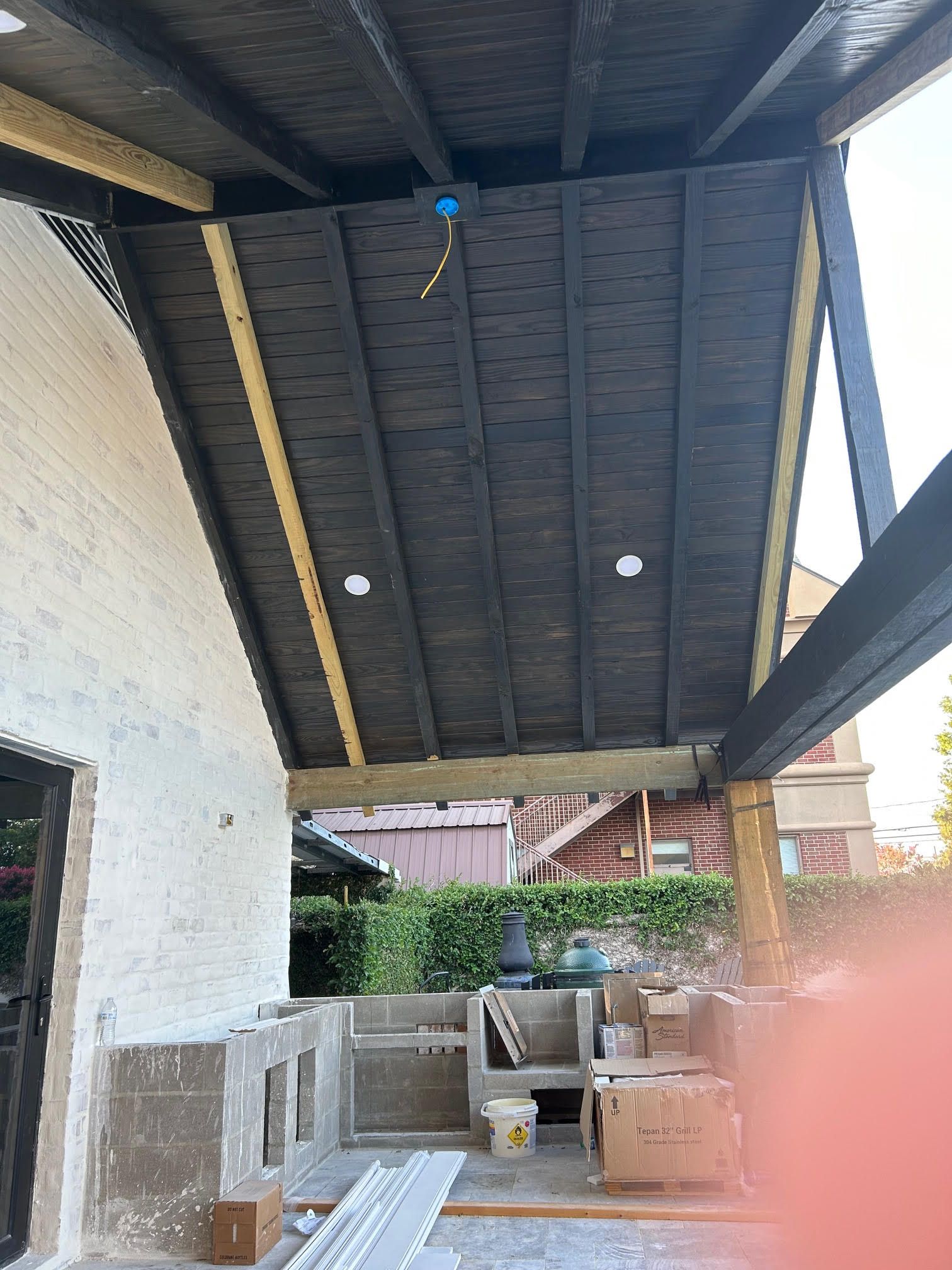 A large swimming pool with a fence in the background