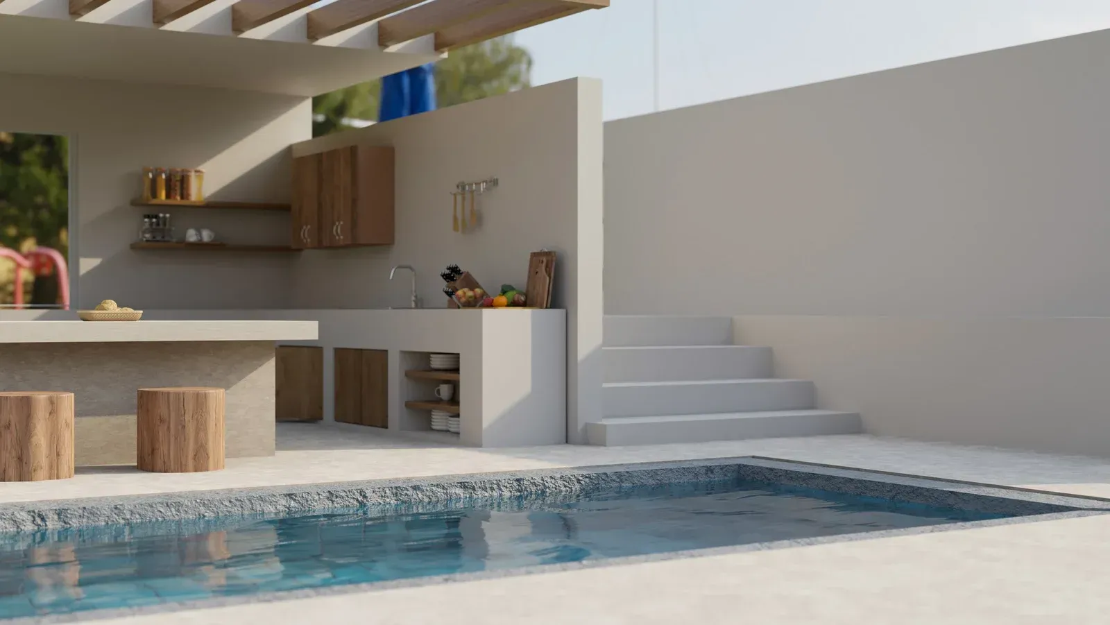A swimming pool with a kitchen and stairs in the background.