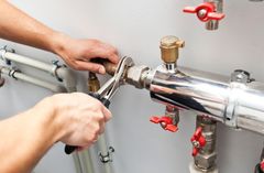 Close-up of employee providing a plumbing service