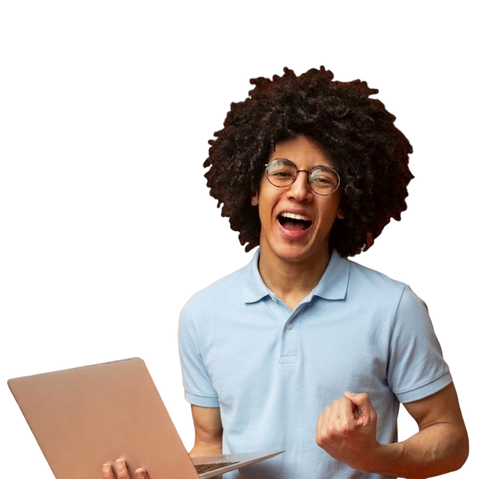A person with curly hair and glasses holding a laptop, smiling and pumping their fist in celebration.