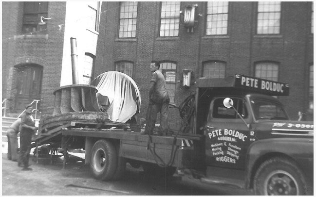 Hydro Units Being Winched Onto Truck