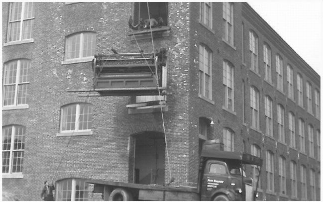 Textile Loom Being Hoisted To 3rd Floor of Building