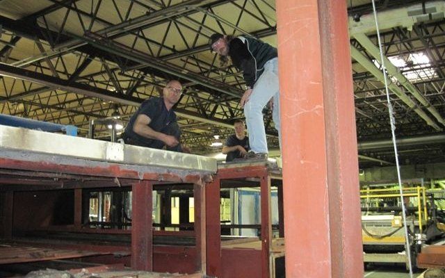 Technicians Completing Oven Installation Project