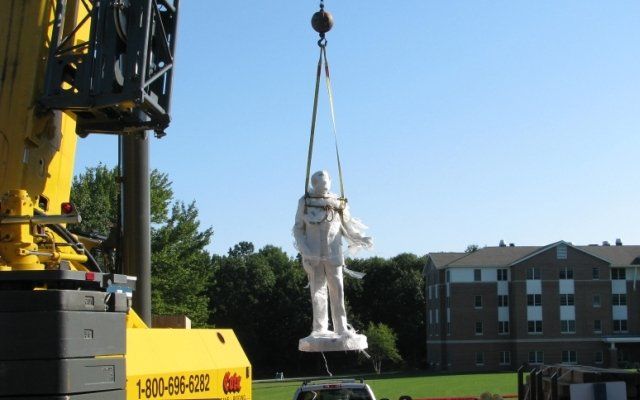 Crane Service Specialists Transporting Statue of President Bush