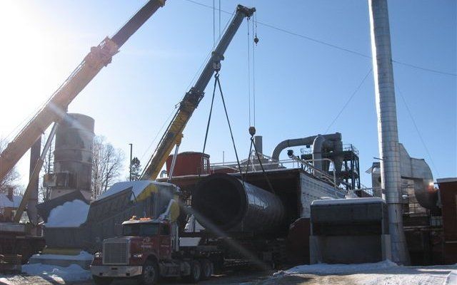 Crane Removing a Dryer Drum From Building at Geneva Wood