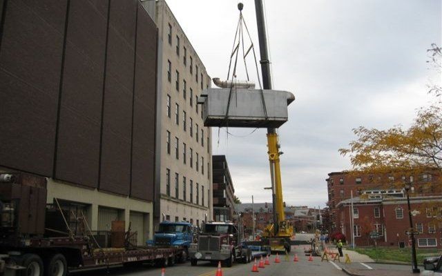 Crane Service Specialists Removing a Generator