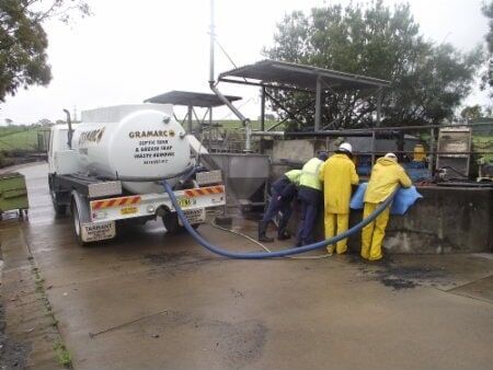 Four Men Cleaning — Septic Tank Cleaning in Armidale, NSW