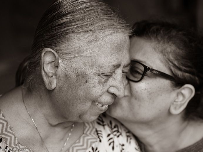 Daughter and mother. Caregiving, eldercare, aging parents, adult kids image from Postcards from Within.