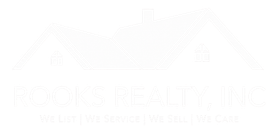Faint white ROOKS REALTY INC. logo with a stylized house roof and small tagline text on a white background
