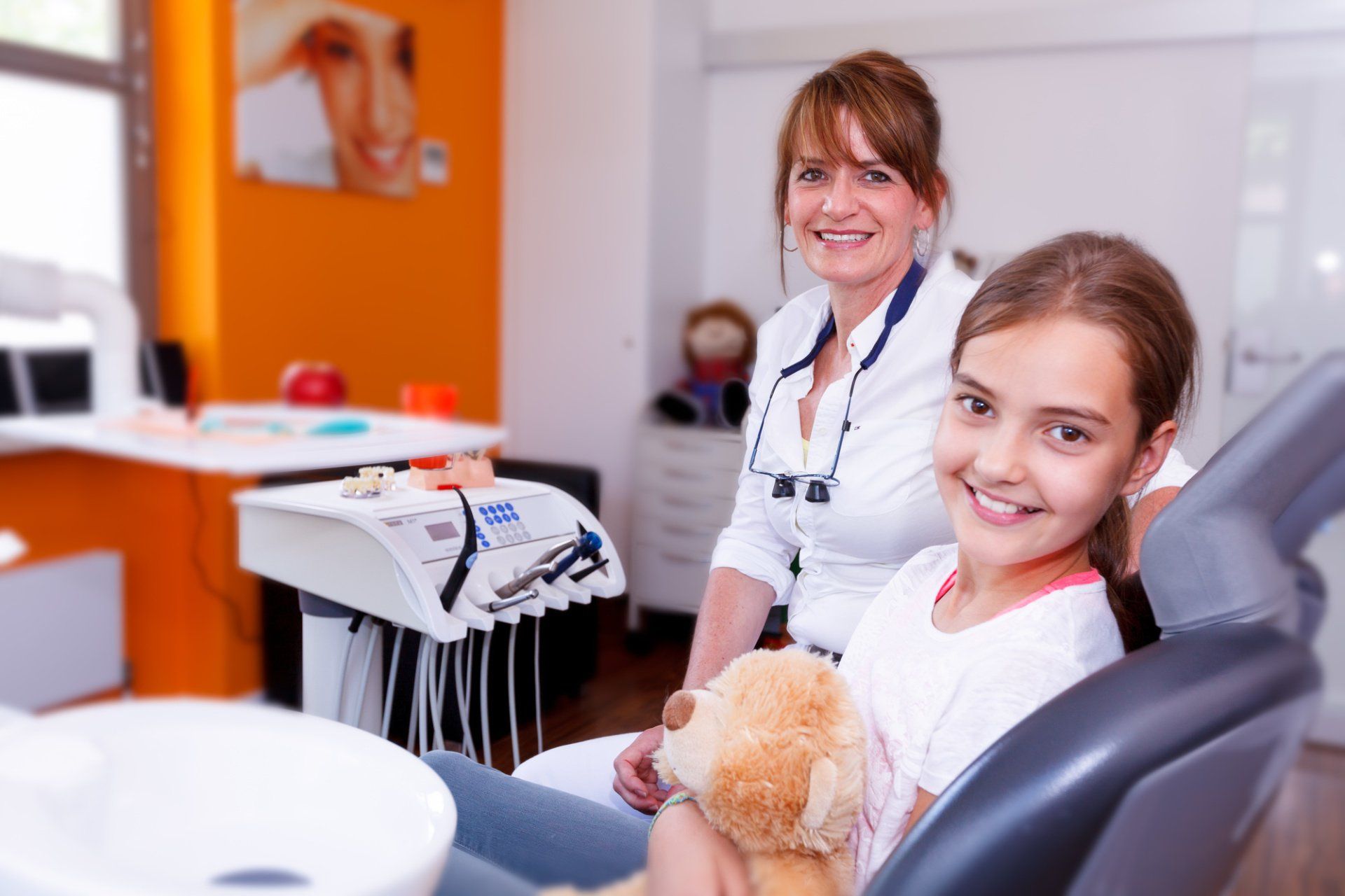 dentist and child smiling