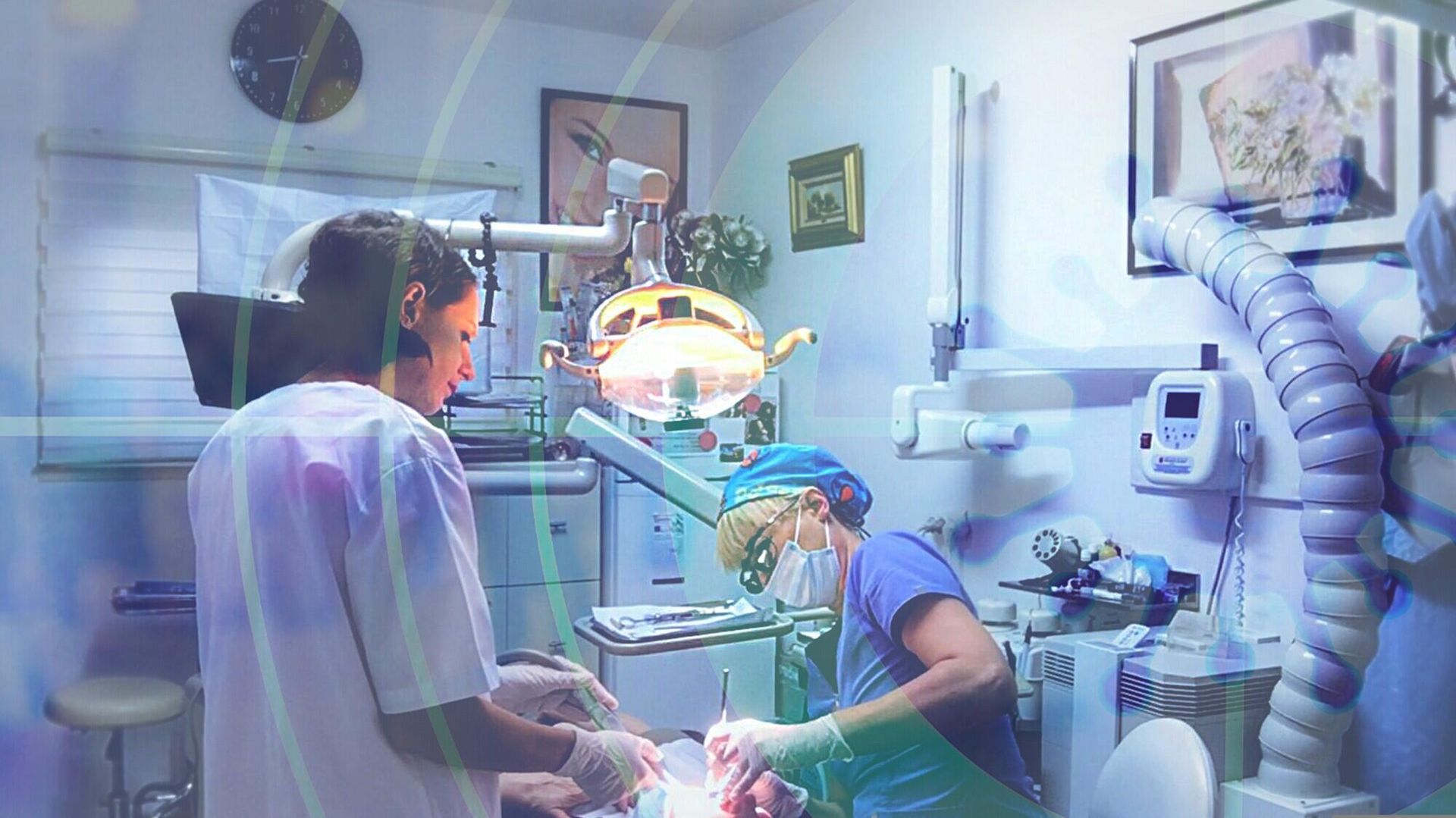 Two dentists are working on a patient in a dental office.