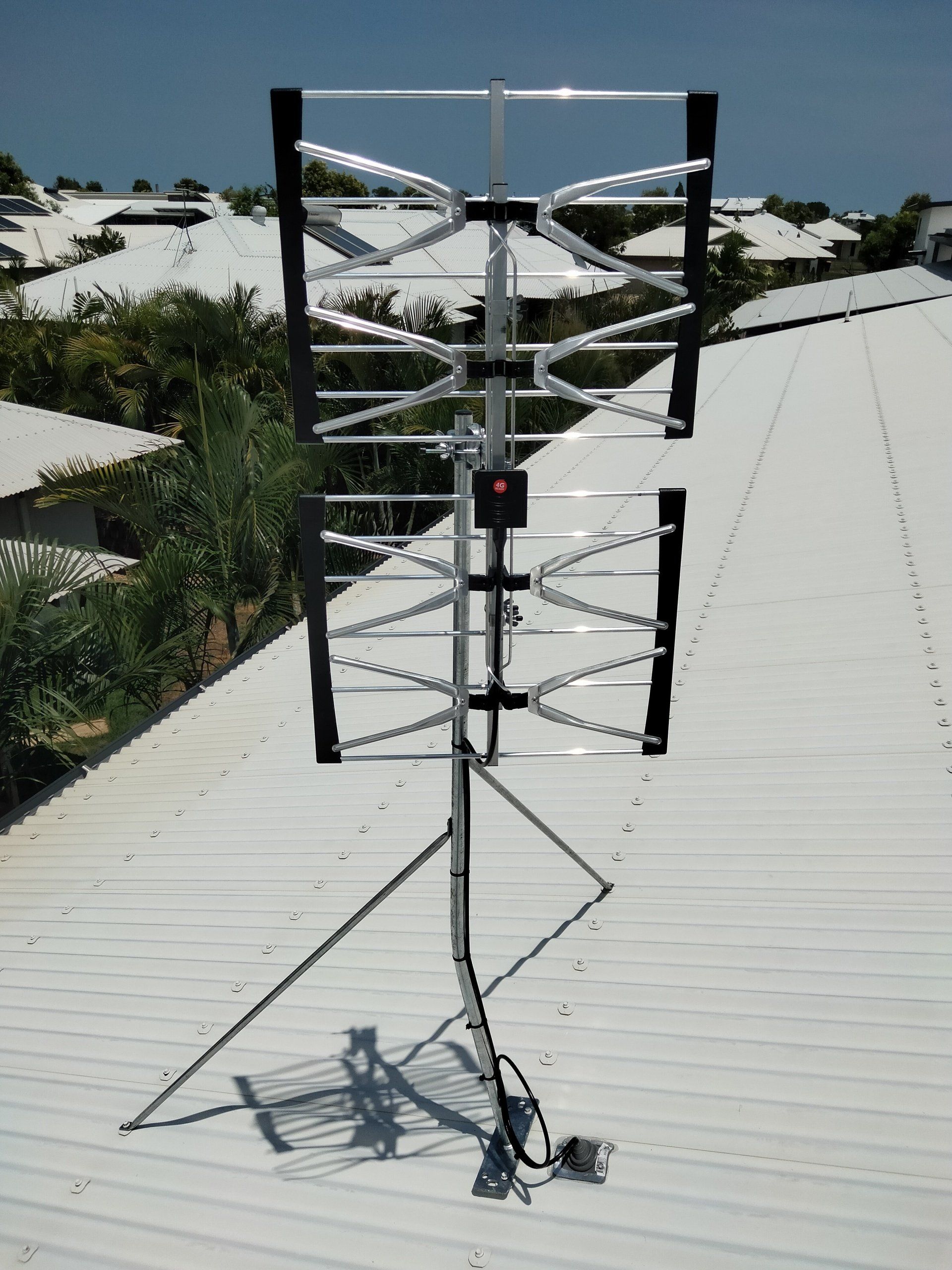 TV Antenna on a Background Cloudy Sky — Coastline Installations In Emu Park, QLD