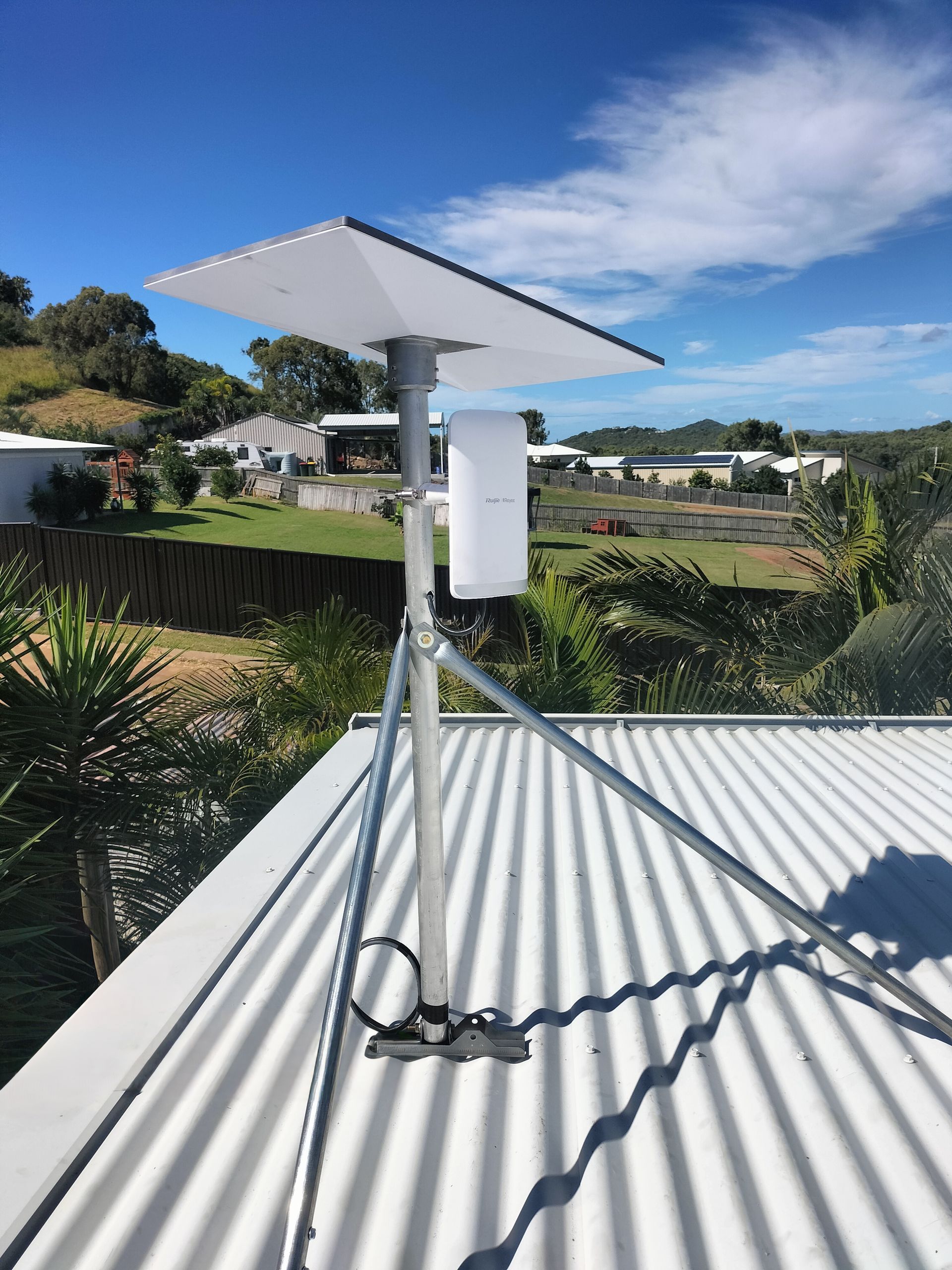Network server rack with multiple switches, patch panels, and a UPS unit.