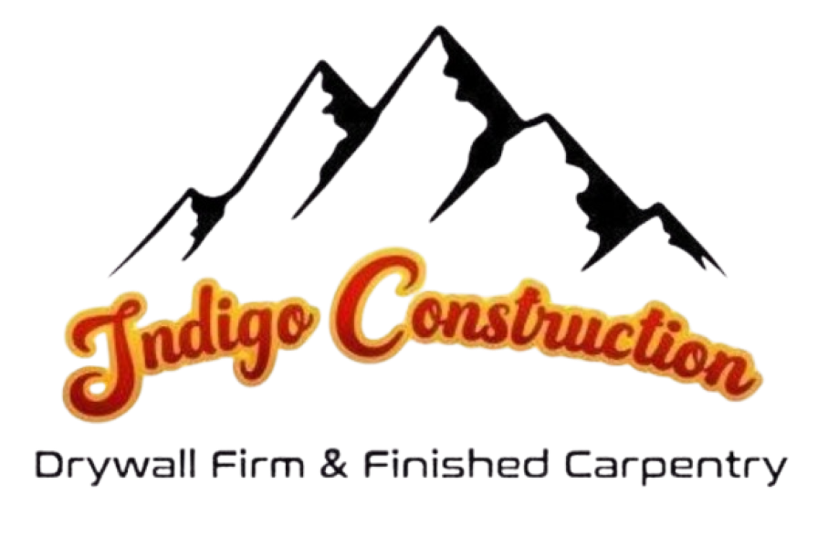 Indigo Construction logo with mountain peaks and the text &ldquo;Drywall Firm & Finished Carpentry&rdquo;