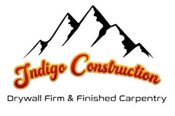 Indigo Construction logo with mountain peaks and the text &ldquo;Drywall Firm & Finished Carpentry&rdquo;