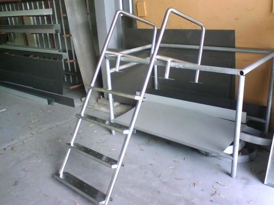 Metal Ladder With Handrails, Likely for a Pool or Dock — R&M Sheetmetal Nowra Metal Roofing in South Nowra, NSW